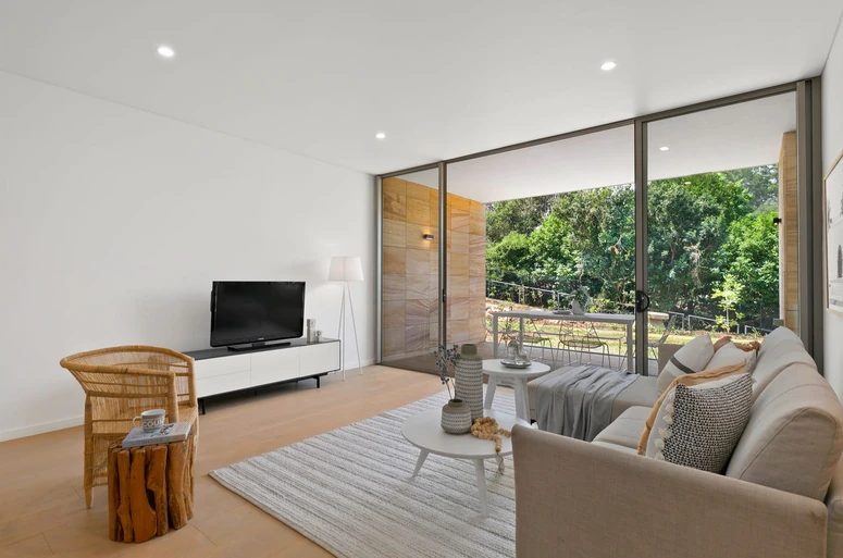 An apartment interior opening onto greenery at Buckingham Road, Killara