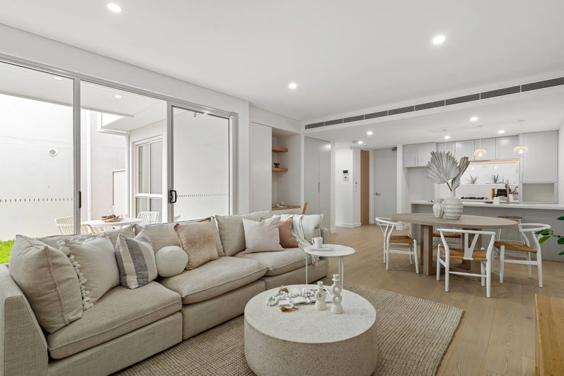 An open living and dining space at President Avenue, Miranda